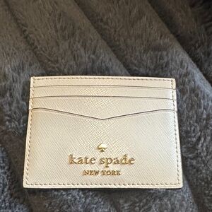 Kate Spade Ivory Card Holder with Gold Logo